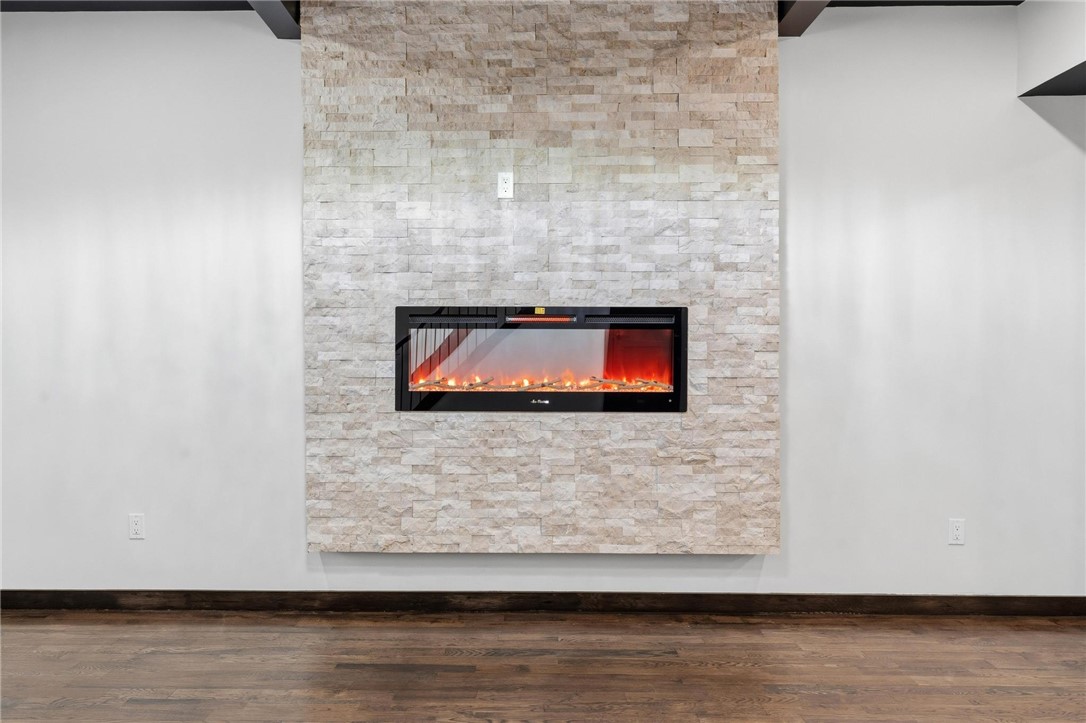 3509 South State Rte 72 Sabina, OH 45169 - Photo 9 of 44 This inviting space features a modern fireplace, perfect for relaxation and comfort.