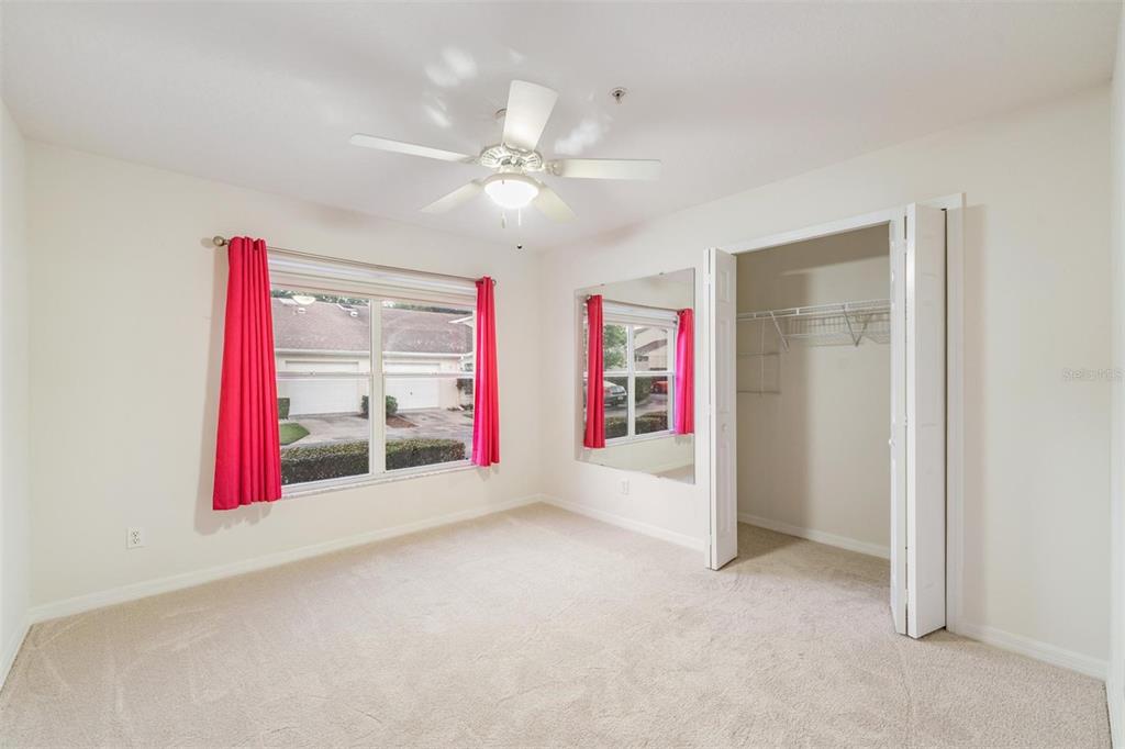 8406 Terrace Meadows Court Temple Terrace, FL 33637 - Photo 21 of 39 a view of empty room with fan and window