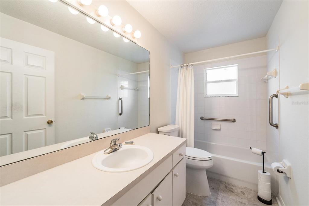 8406 Terrace Meadows Court Temple Terrace, FL 33637 - Photo 22 of 39 a bathroom with a sink toilet and shower