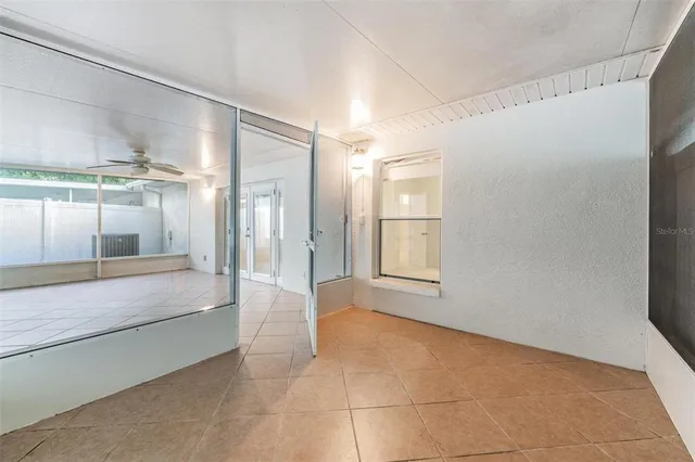 a bathroom with bathtub and shower