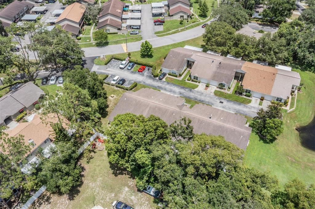 8406 Terrace Meadows Court Temple Terrace, FL 33637 - Photo 36 of 39 an aerial view of a house with a yard