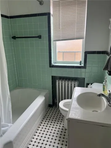 a bathroom with a sink and a bathtub