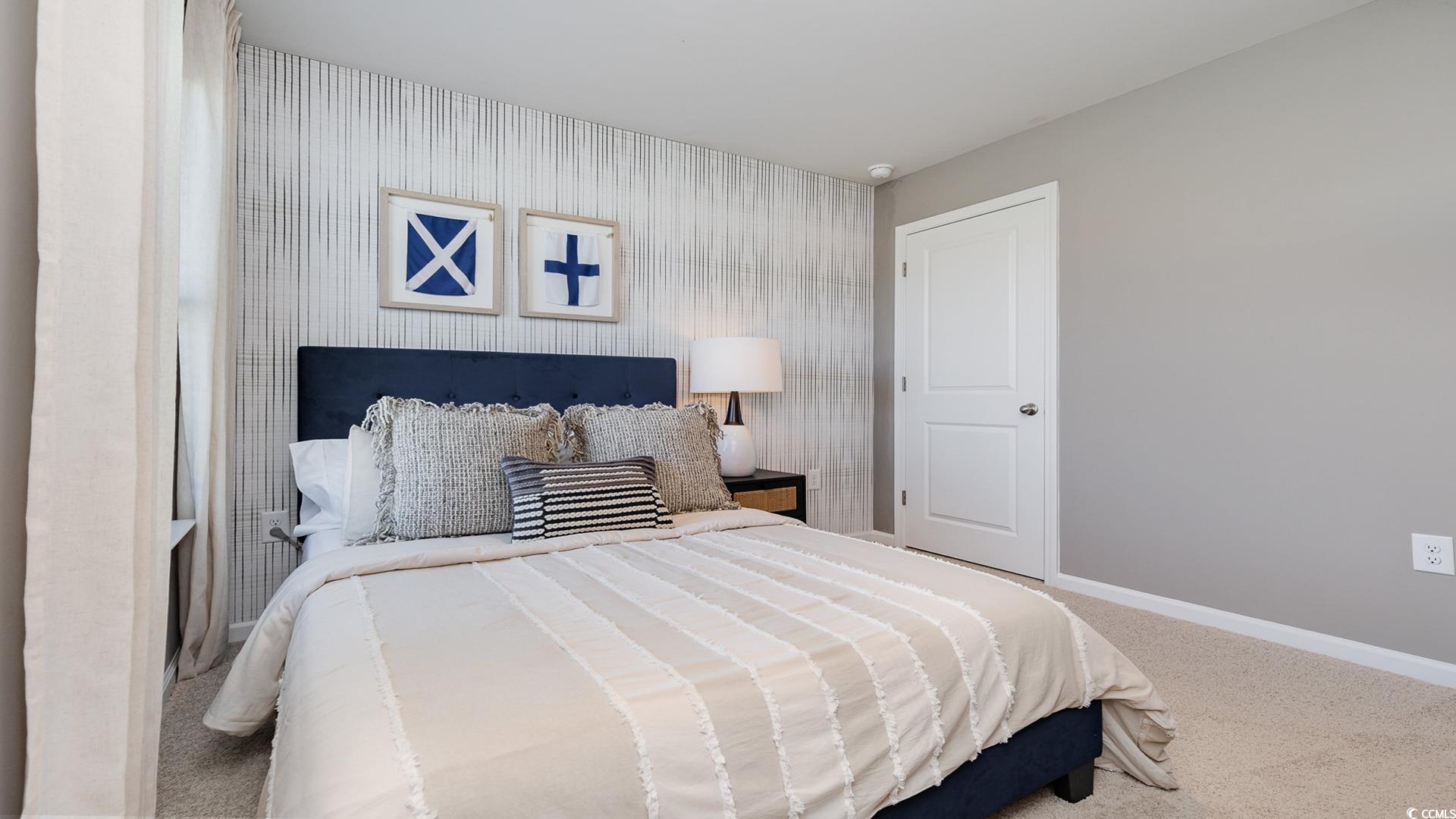 300 Long Beard Way Loris, SC 29569 - Photo 26 of 40 Bedroom featuring carpet flooring and wallpapered walls