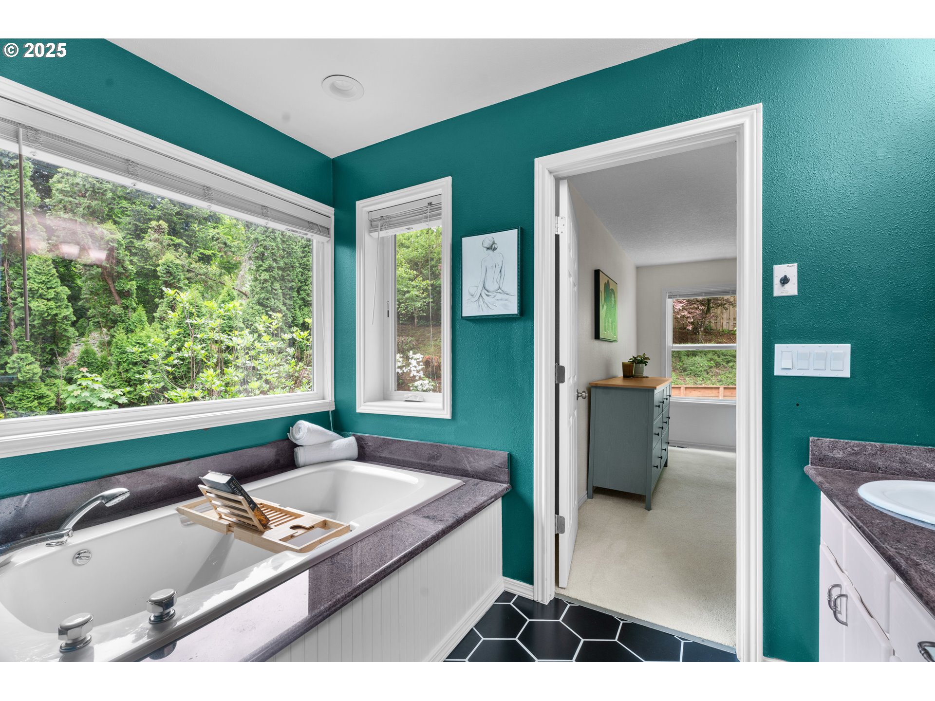 6502 Apollo Road West Linn, OR 97068 - Photo 12 of 48 a bathroom with a tub sink and mirror
