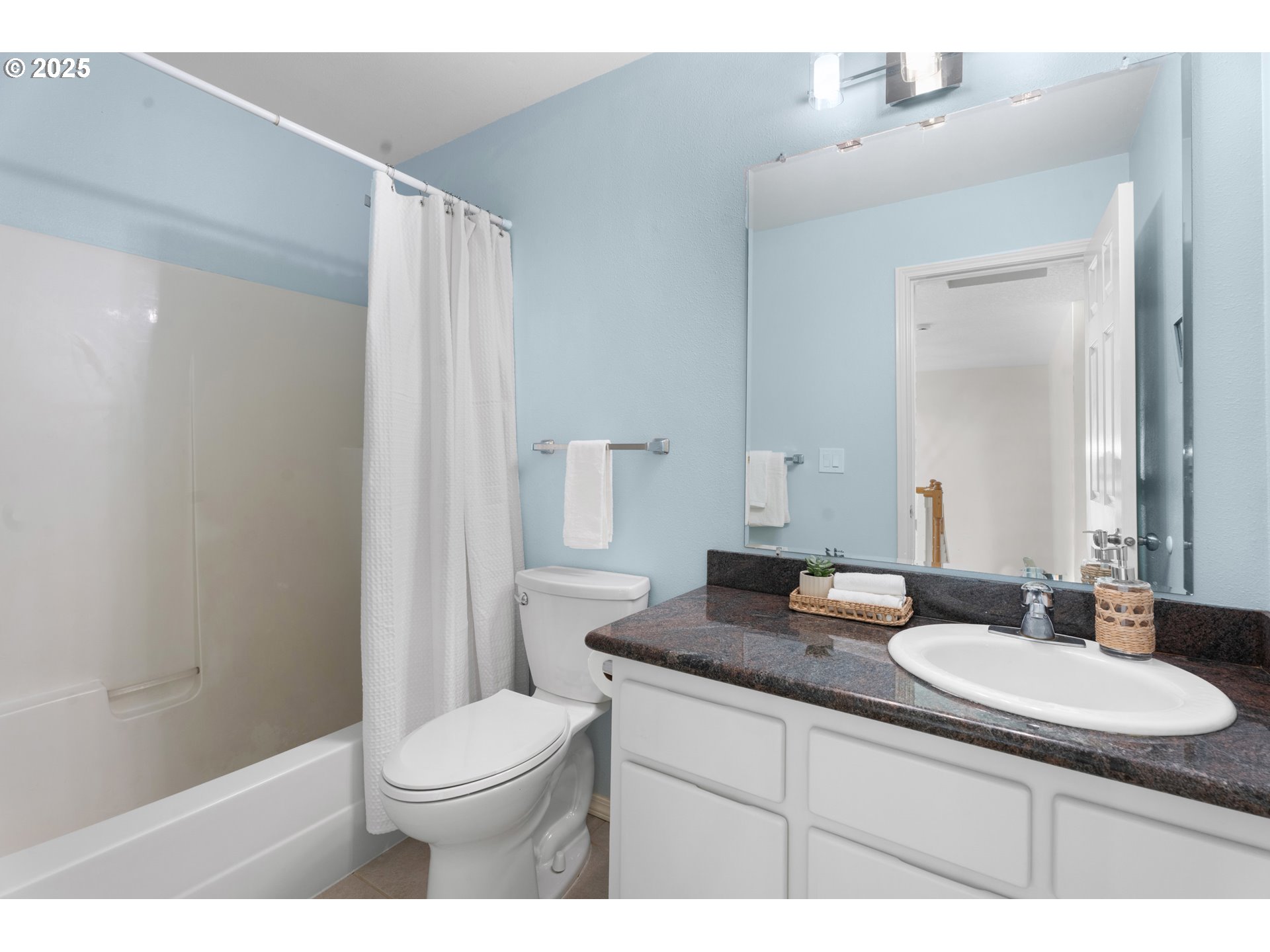 6502 Apollo Road West Linn, OR 97068 - Photo 14 of 48 a bathroom with a granite countertop sink toilet and shower
