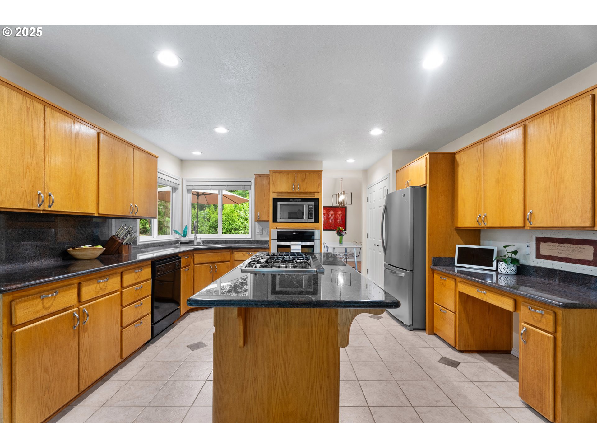 6502 Apollo Road West Linn, OR 97068 - Photo 29 of 48 a kitchen with sink a counter top space appliances and cabinets