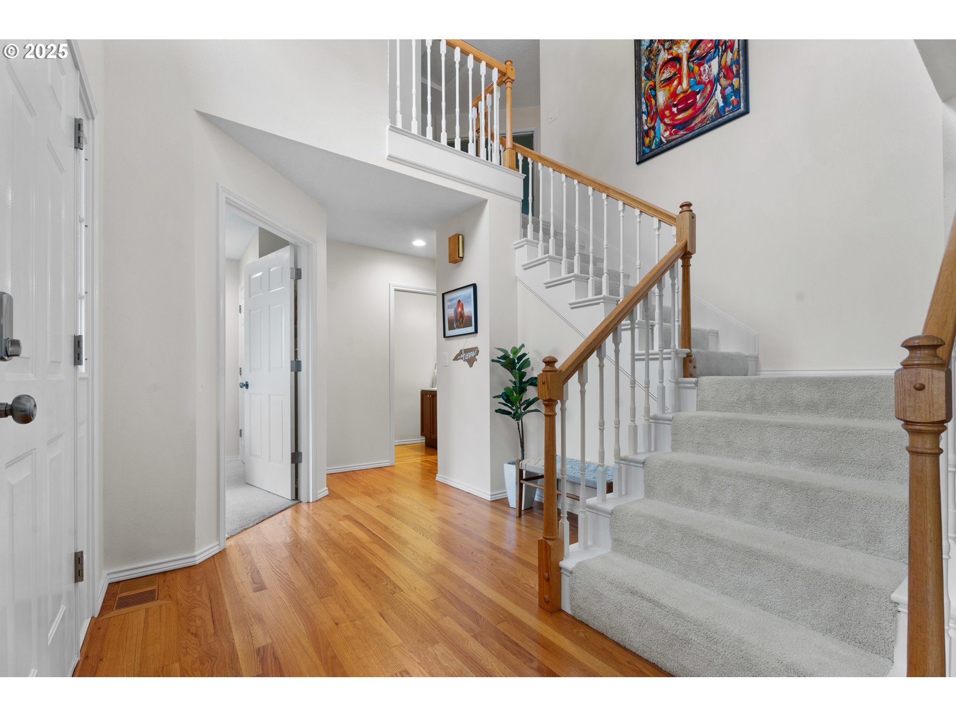 6502 Apollo Road West Linn, OR 97068 - Photo 3 of 48 a view of entryway and hall with wooden floor