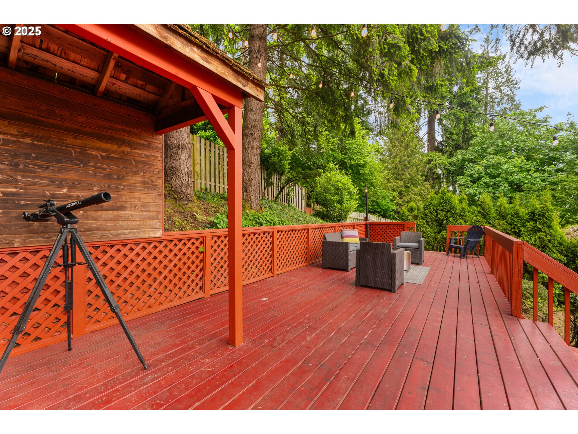 6502 Apollo Road West Linn, OR 97068 - Photo 40 of 48 a view of a roof deck with wooden floor and fence