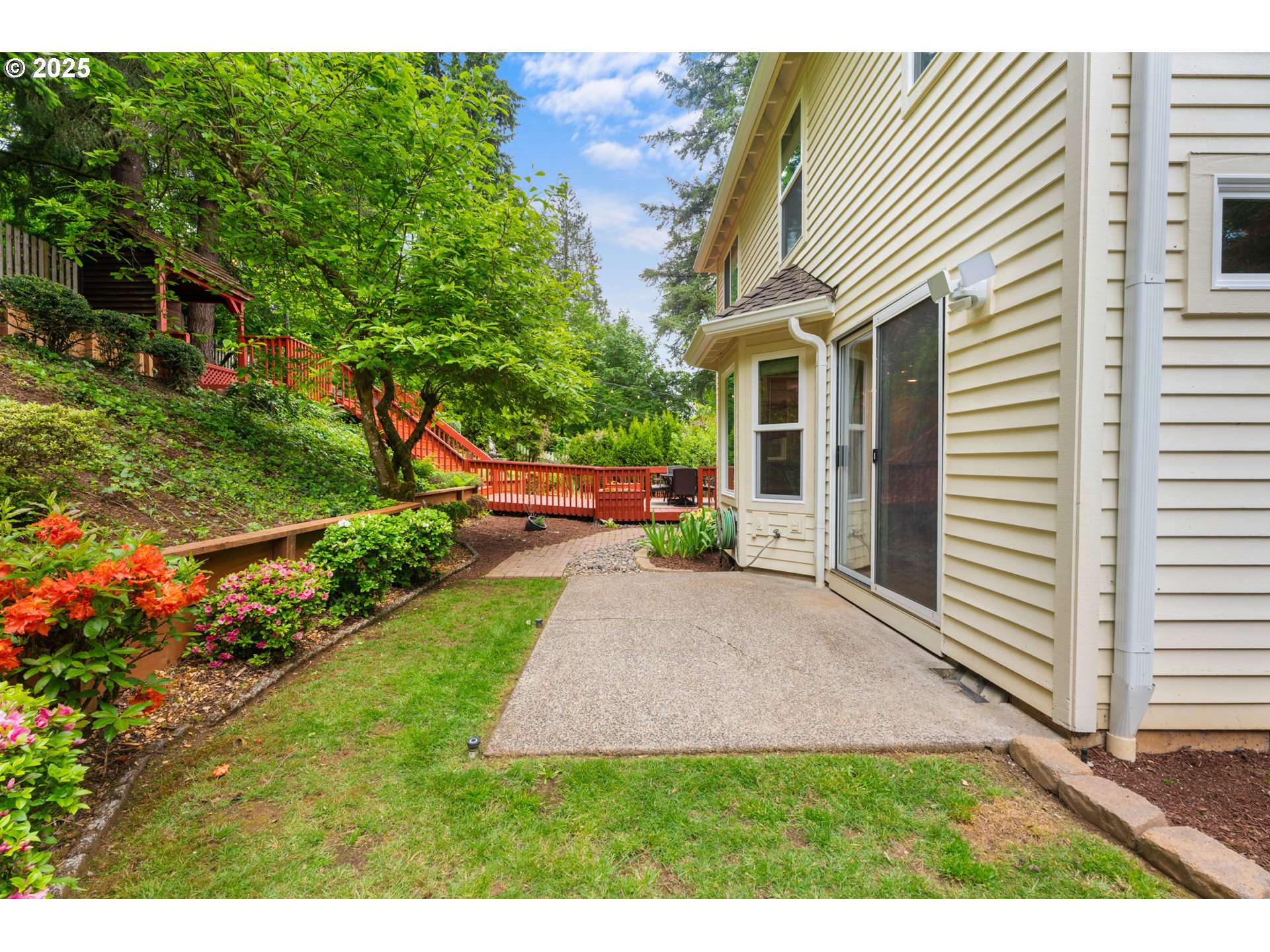 6502 Apollo Road West Linn, OR 97068 - Photo 42 of 48 a view of a house with a yard and potted plants