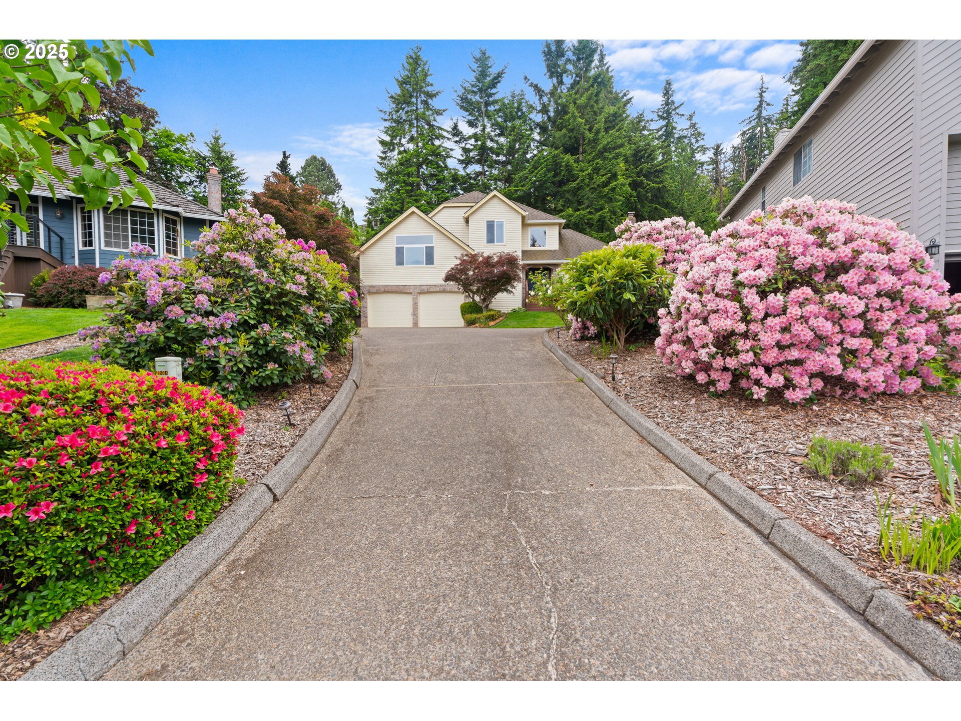 6502 Apollo Road West Linn, OR 97068 - Photo 47 of 48 a front view of a house with a yard and fountain