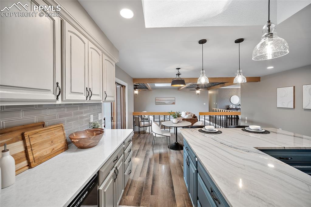 2304 Lazy R Lane Colorado Springs, CO 80915 - Photo 14 of 49 a kitchen with counter top space a sink and appliances