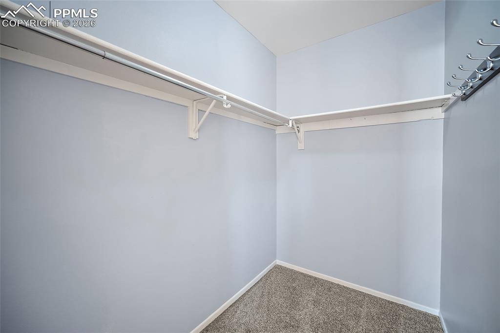 2304 Lazy R Lane Colorado Springs, CO 80915 - Photo 30 of 49 a view of an empty walk in closet