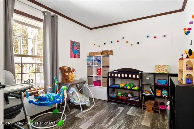 a room with furniture and a window