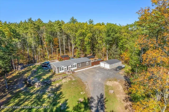 a view of a yard with trees