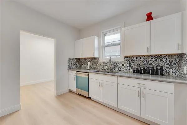 a view of kitchen with a sink