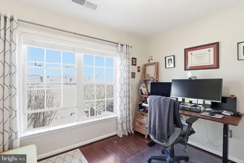 a view of a hallway with washer and dryer