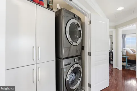 a view of stairs and hardwood floor