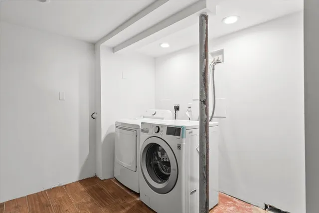 a utility room with dryer and washer