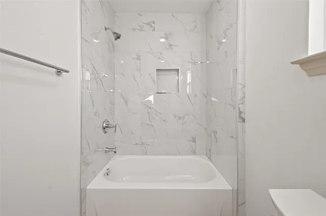 a bathroom with a bathtub