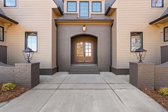 a kitchen with a sink and refrigerator