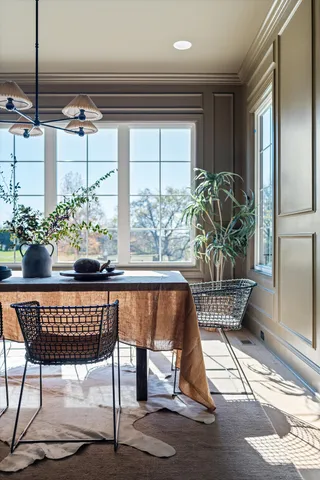 a bedroom with a large bed and a couch