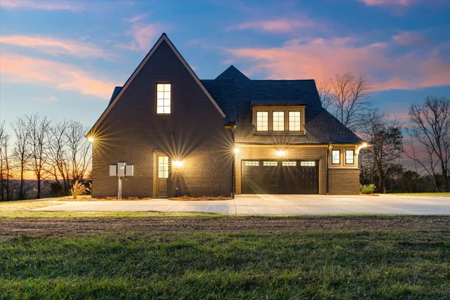 a living room with furniture or couch and a table