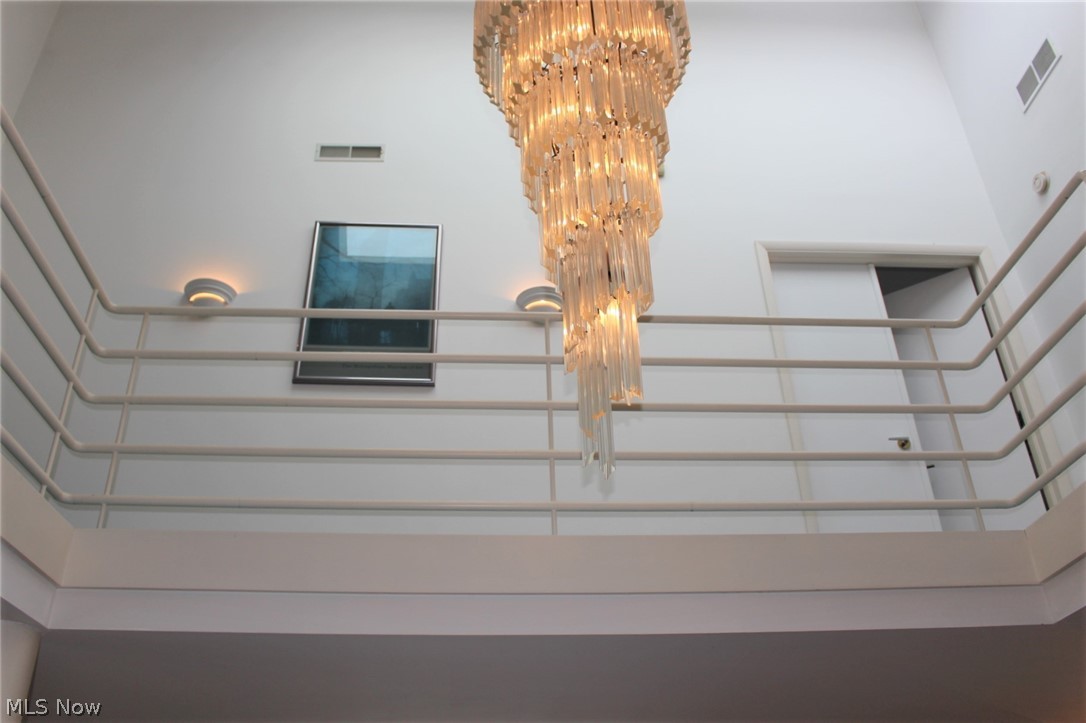 13597 County Line Road Chagrin Falls, OH 44022 - Photo 18 of 35 Custom Chandelier and balcony overlooking the Foyer and Living Room.