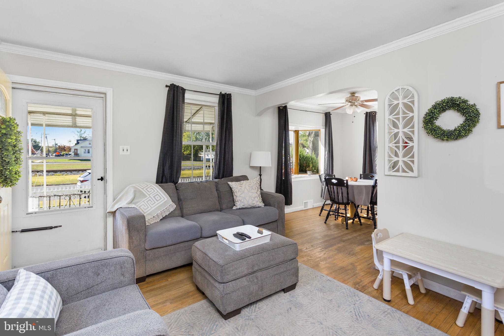 29 West Broadway Maple Shade, NJ 08052 - Photo 11 of 35 a living room with furniture and a window