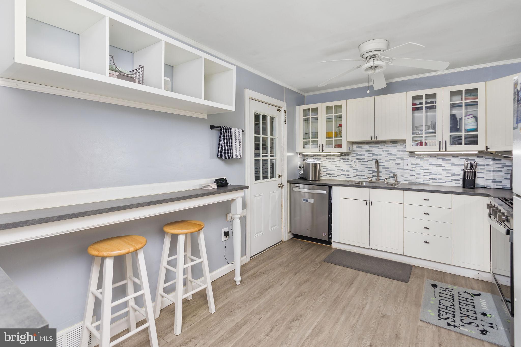 29 West Broadway Maple Shade, NJ 08052 - Photo 13 of 35 a kitchen with stainless steel appliances granite countertop a sink and cabinets