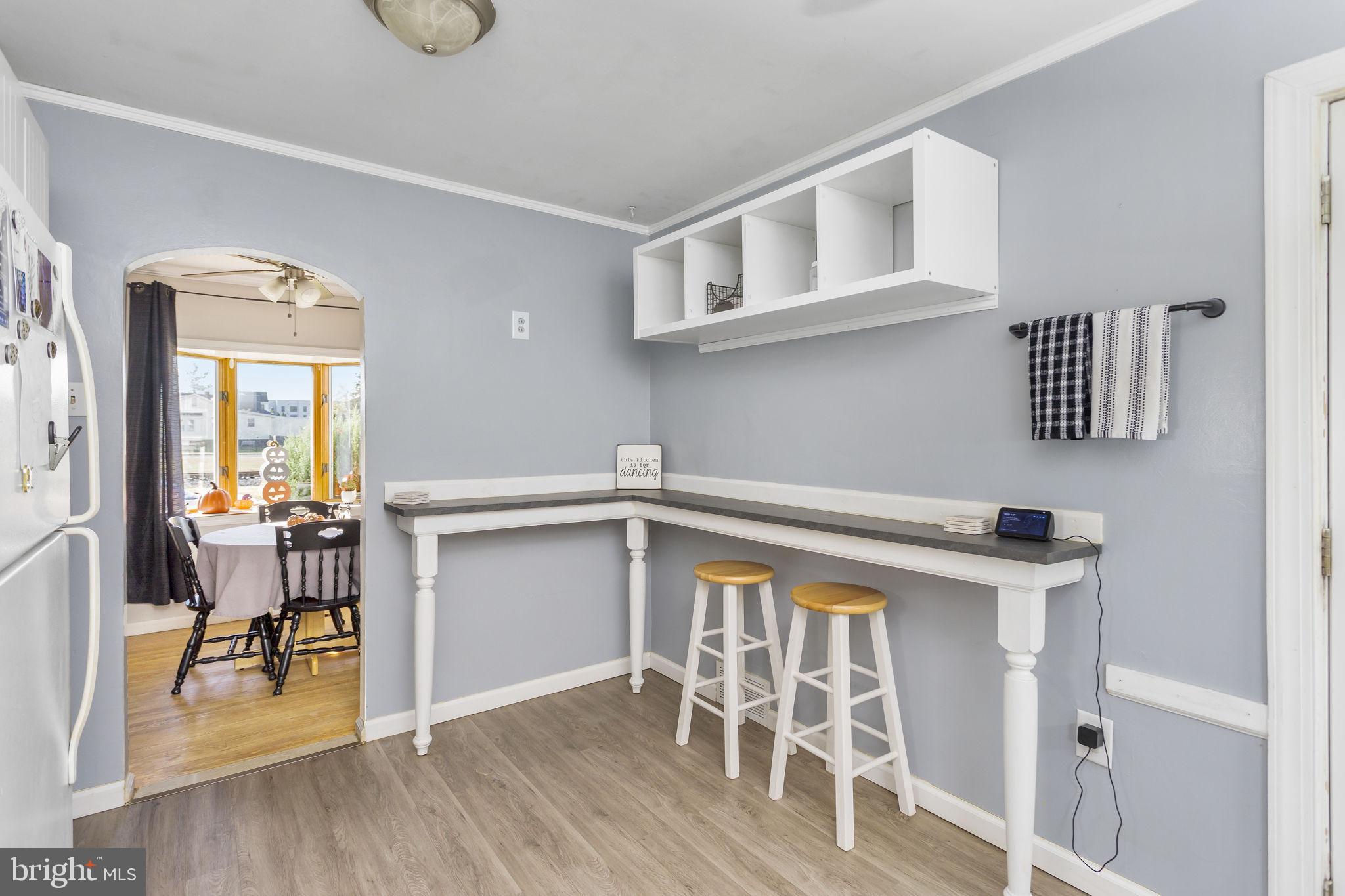 29 West Broadway Maple Shade, NJ 08052 - Photo 15 of 35 a kitchen with a cabinets and chairs