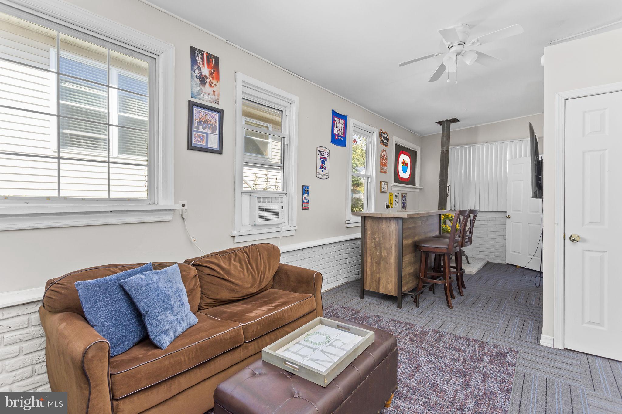 29 West Broadway Maple Shade, NJ 08052 - Photo 18 of 35 a living room with furniture and a window