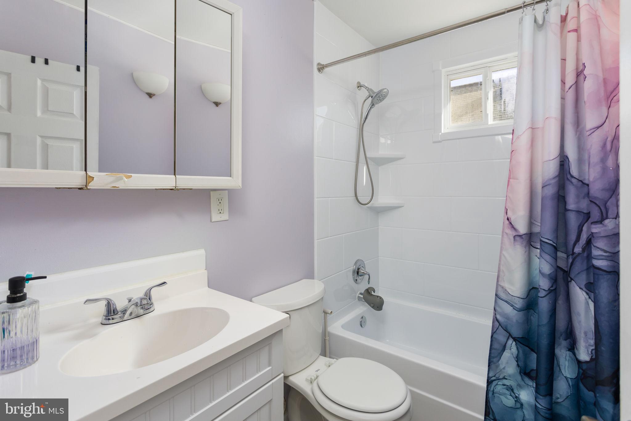 29 West Broadway Maple Shade, NJ 08052 - Photo 21 of 35 a bathroom with a sink a toilet and a bathtub
