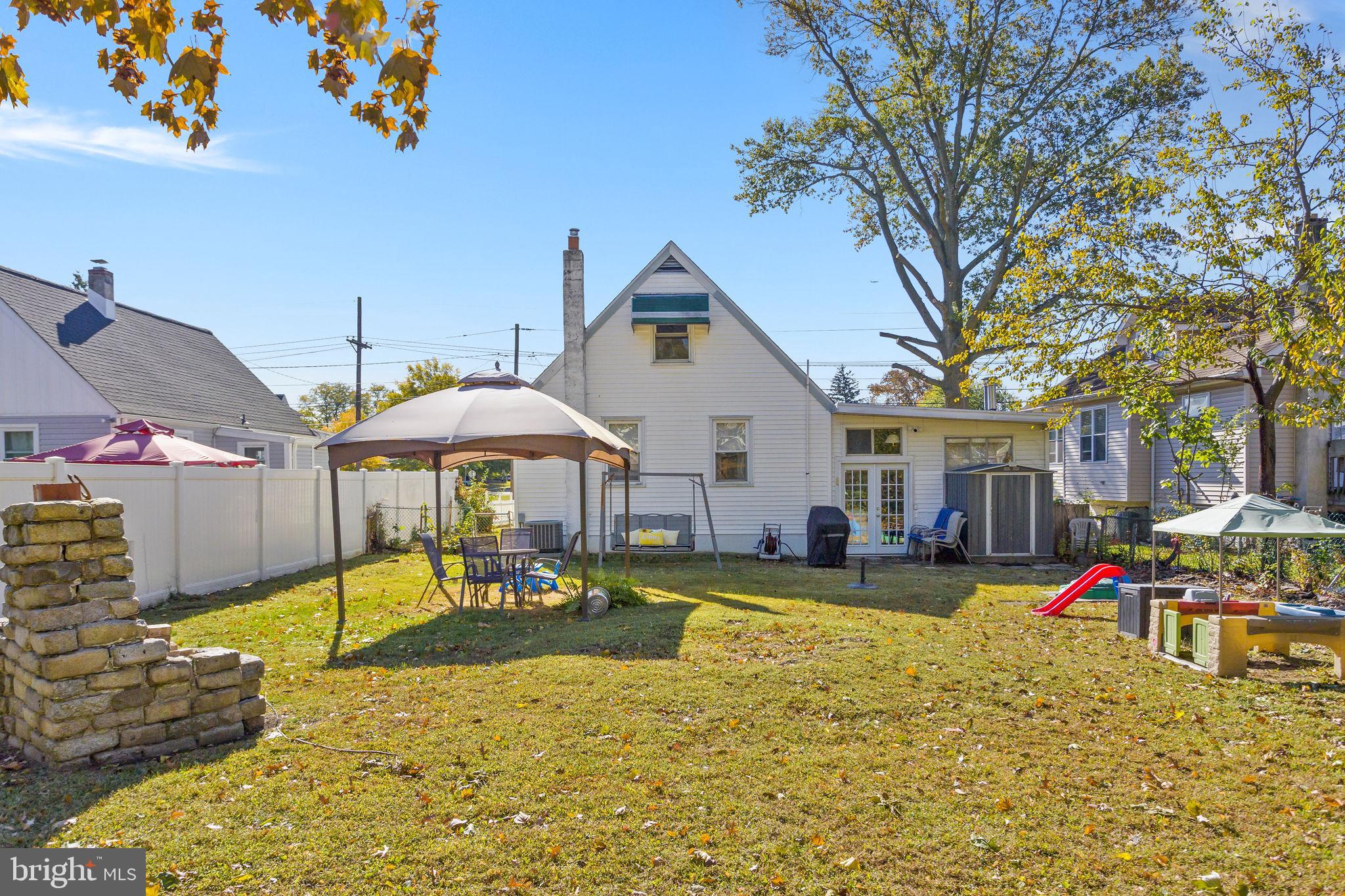 29 West Broadway Maple Shade, NJ 08052 - Photo 6 of 35 a swimming pool view with a seating space and a garden view