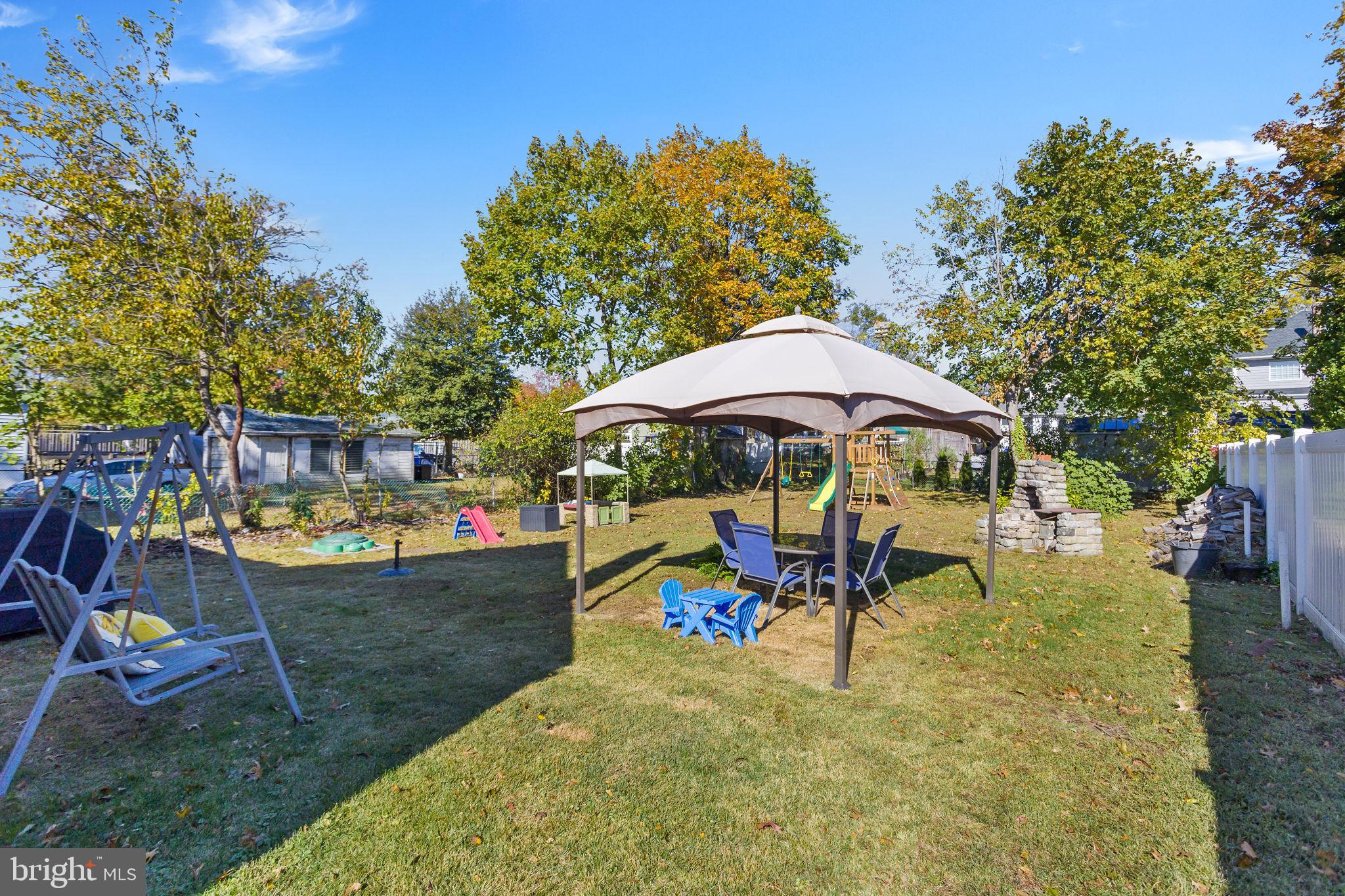 29 West Broadway Maple Shade, NJ 08052 - Photo 9 of 35 a view of a swimming pool with a patio
