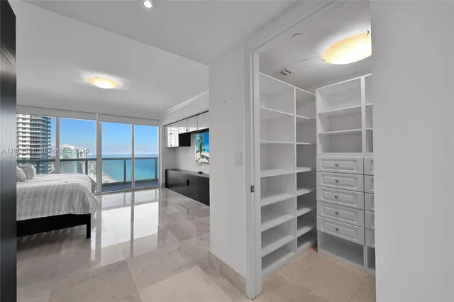 a living room with furniture and natural light