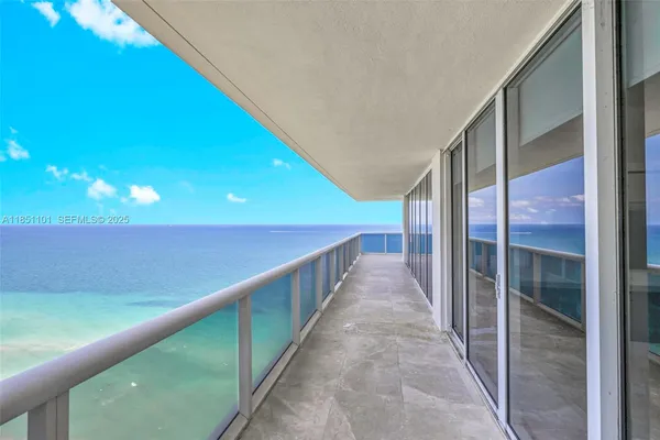 a view of an ocean from a balcony