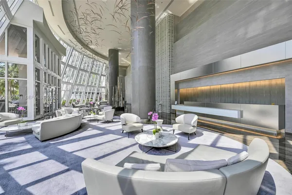 a room with gym equipment and a large window