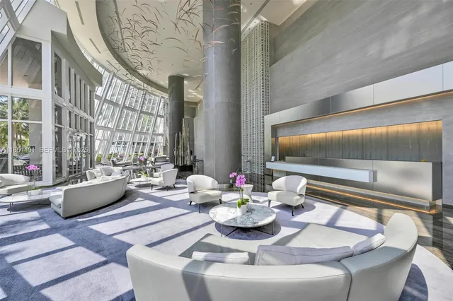 a room with gym equipment and a large window