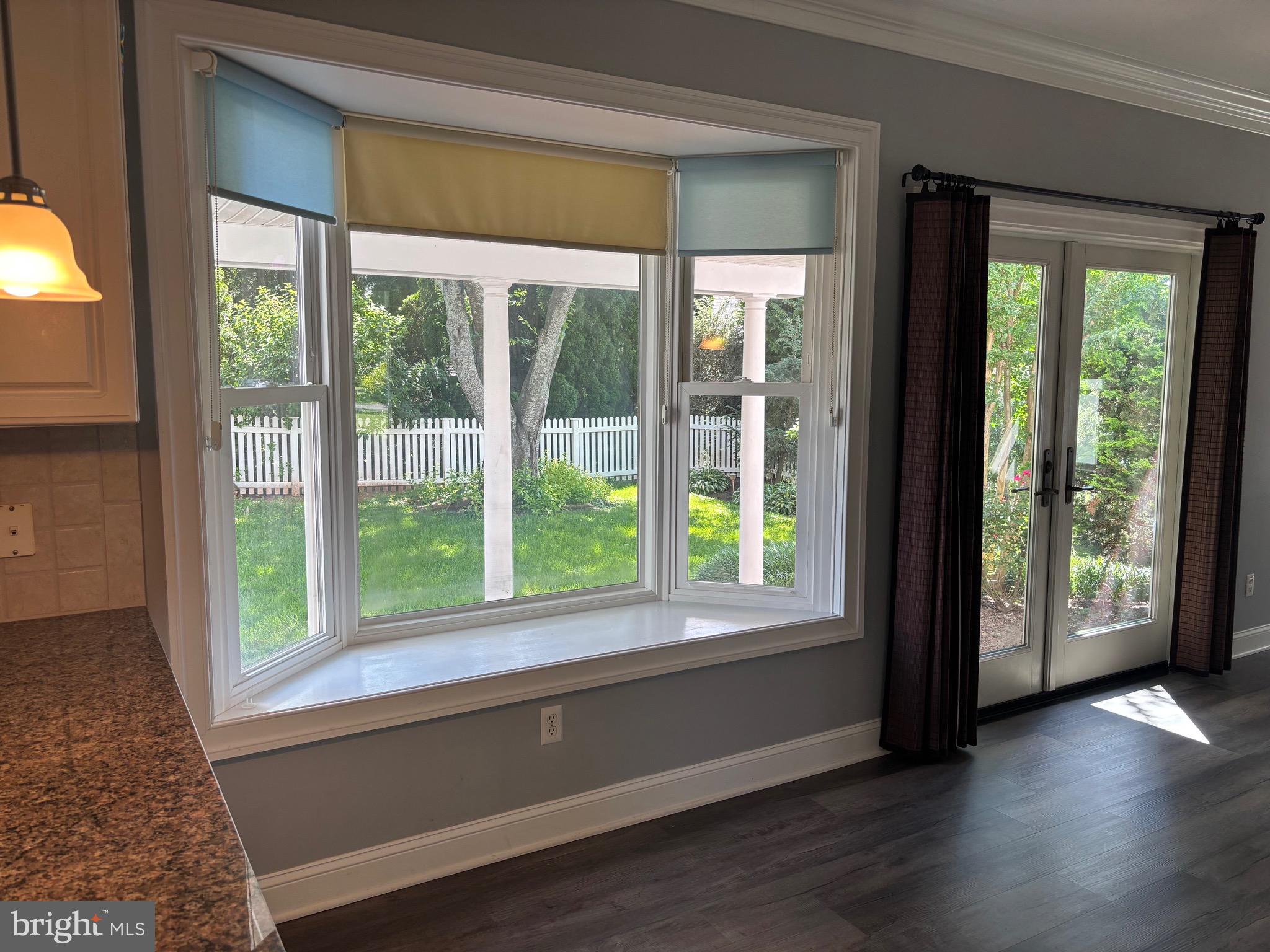 629 Country Club Road Culpeper, VA 22701 - Photo 10 of 27 a view of an entryway with wooden floor and windows