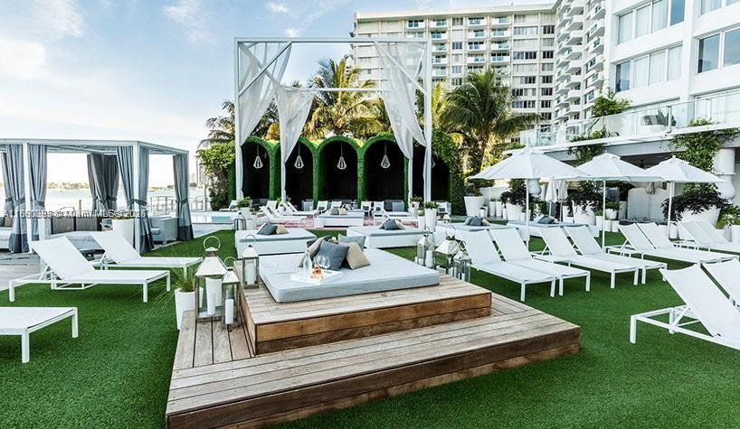 1100 West Avenue, Unit 1402 Miami Beach, FL 33139 - Photo 16 of 58 a view of an house with backyard and patio