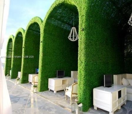 1100 West Avenue, Unit 1402 Miami Beach, FL 33139 - Photo 24 of 58 a view of a chairs and tables in the patio