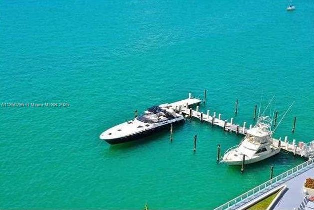 1100 West Avenue, Unit 1402 Miami Beach, FL 33139 - Photo 34 of 58 a view of a table and chairs in the patio