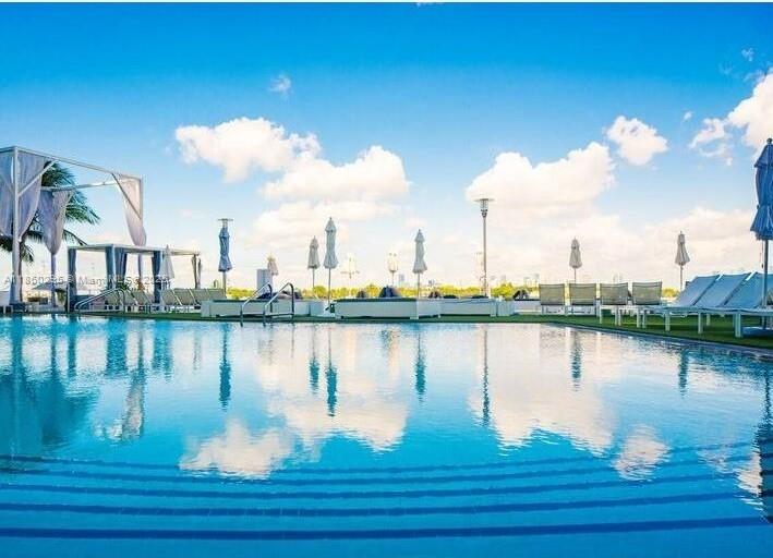 1100 West Avenue, Unit 1402 Miami Beach, FL 33139 - Photo 39 of 58 a view of a lake with houses