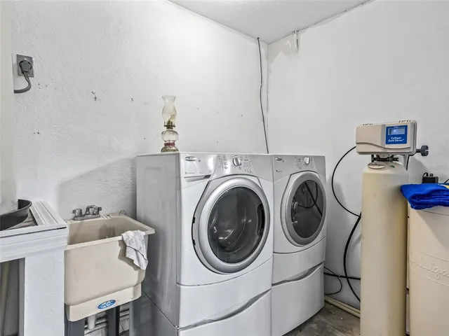 a utility room with dryer and washer