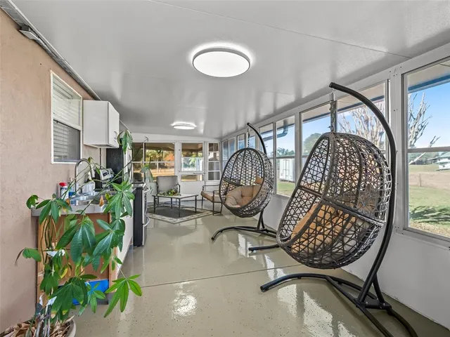 a view of a livingroom with furniture