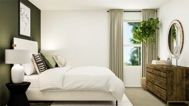 a large white bed in a white room