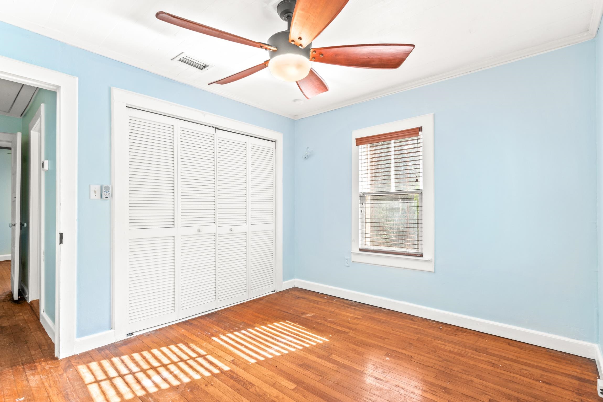 26 Ponce De Leon Avenue St. Augustine, FL 32080 - Photo 13 of 51 a view of an empty room with window and wooden floor