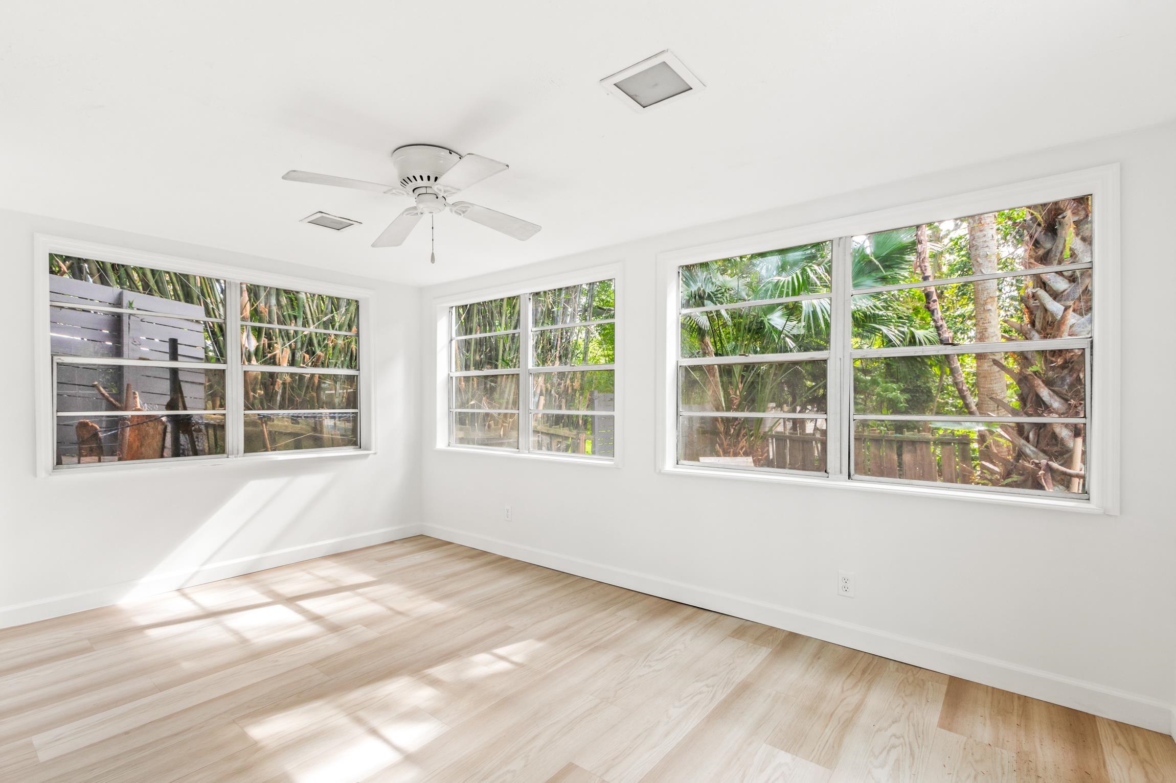 26 Ponce De Leon Avenue St. Augustine, FL 32080 - Photo 27 of 51 a view of an empty room with a window and kitchen area
