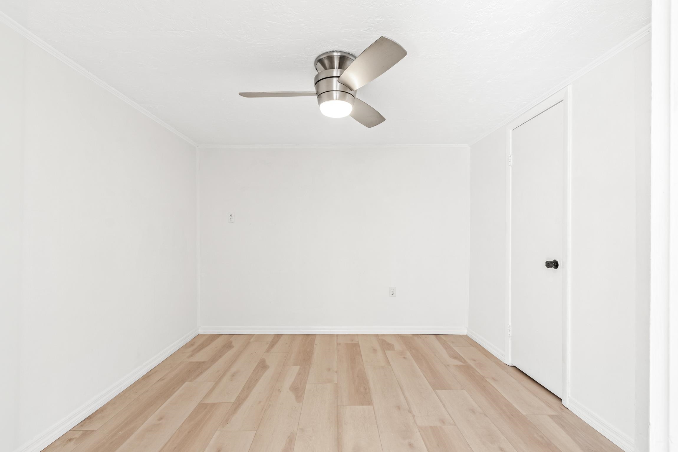26 Ponce De Leon Avenue St. Augustine, FL 32080 - Photo 30 of 51 a view of a room with wooden floor and white walls