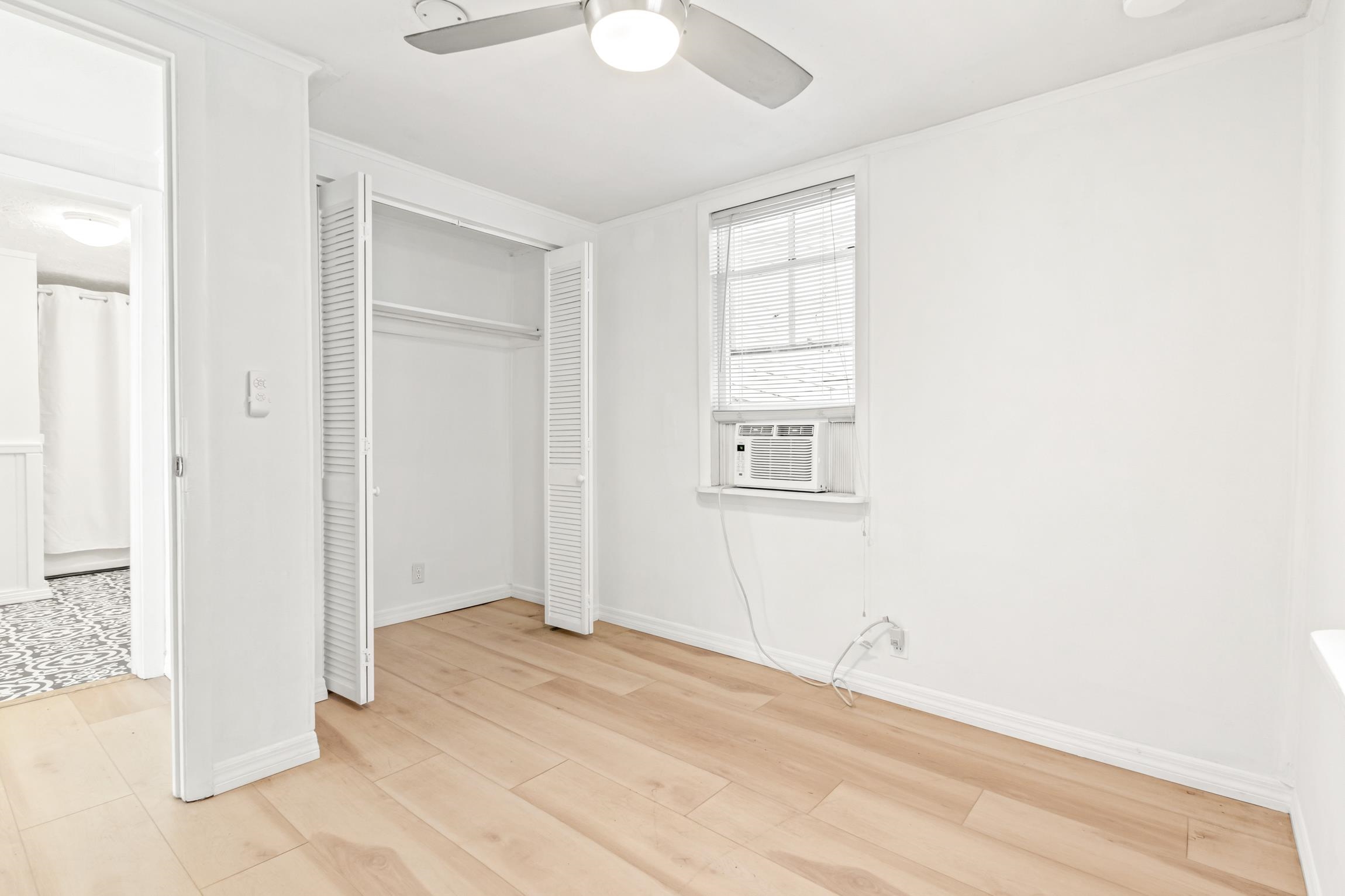 26 Ponce De Leon Avenue St. Augustine, FL 32080 - Photo 33 of 51 an empty room with windows and closet